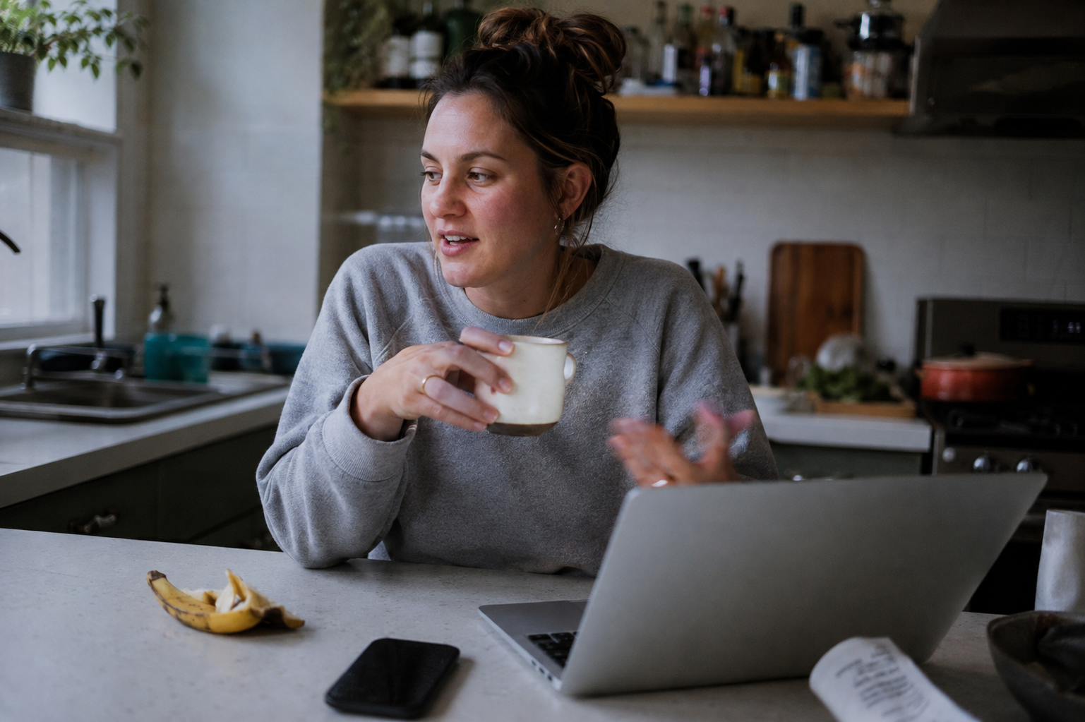 bmr calculator for weight loss  -  woman checking her calorie deficit results on a laptop